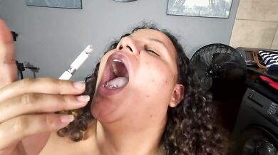 Bbw smokes naked using her tits as an ashtray