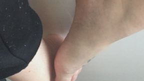 ON THE EDGE OF THE WASHING MACHINE SITTING FOR A RIDE