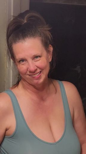 Captivating moment from &quot;A Lonely MILF seduces a young man who rents her basement apartment. &quot;The landlady&quot; Part 1.&quot;