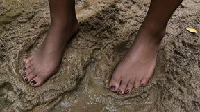 Black stockings in mud, muddy feet, walking in stockings without shoes in mud, dirty feet, girl stuck in mud, muddy nylons