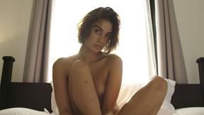 ”Sexy brunette with amazing big ass strips & spreads sexy legs”