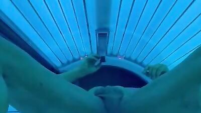 Smooth muscle hunk stripping and stroking in tanning room