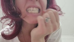 I smoke, showing my teeth that haven't been brushed for five days