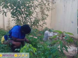 Afro gardener AKIILISA checking out the fruits of the season/lover's Tshirt and small butt short/