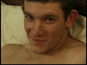 Sexy twink plays with his hard dick in bed