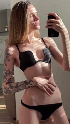 Skinny bitch shows her sexy body to daddy