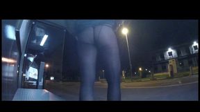 Flashing in pantyhose at the bus stop by night