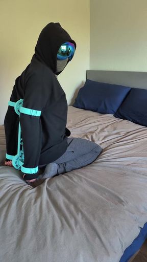 Slim solo babe in bondage gets hogtied while lying down