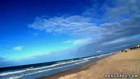 Two horny guys walking along Brazilian beach