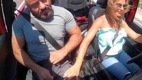 Busty Blonde MILF Gives Road Head While Driving