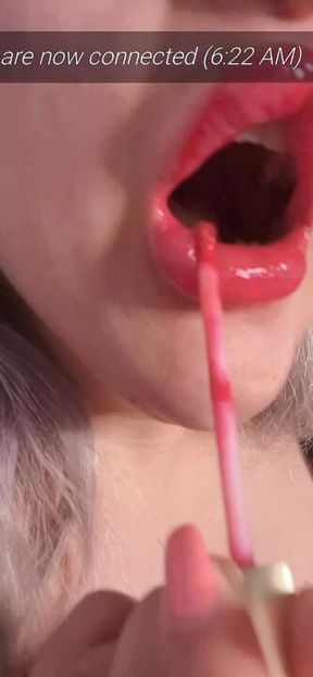 Red lipstick gloss is captivating!