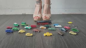 Giantess goddess Charlie Caroline Crushes a lots of tiny cars and a bus in mega Wedges with painted toenails close ground view