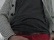 Bulging in red lace underwear while doing laundry