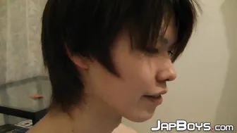 Japanese twink spreads his tight ass and strokes his big cock solo