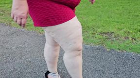 Chubby hijab MILF shows off big booty and pees during walk
