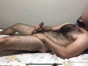 While lying on the bed, I jerked off and ejaculated my sperm on my belly