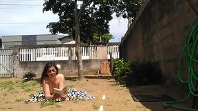 My wife sunbathing naked outside