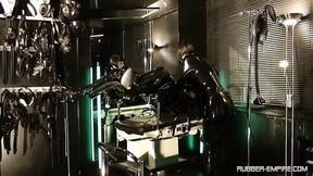 Rubber doll gets pounded to ecstasy by multiple cocks