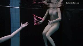 Two girls with natural tits in their perfect underwater show