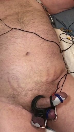 Estim with steel nipple clamps and tightly bound dick and balls. HFO   Clip 2