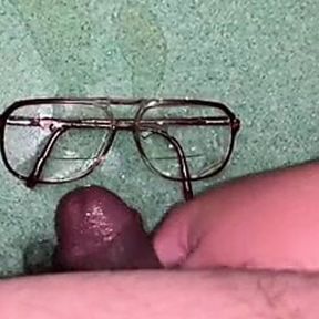 Pissing and cumming on ugly glasses.