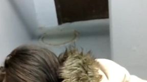 MILF gets a facial in the park bathroom