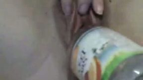 Close up solo with me banging my crotch with bottles