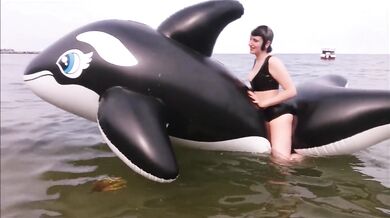 Lynn gets insatiable on the beach with her inflatable wale