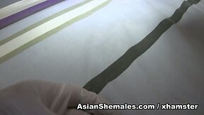 Balloon from Thailand Playing with her Long Hard Cock
