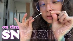 The disgusting giantess shoves you up her nose and sneezes