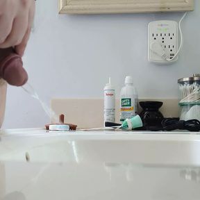 Cub Pissing in Bathroom Sink