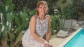 American granny playing with her pussy at the pool