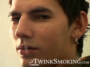 Hung Antony puffs his cigarette while stroking his big dick