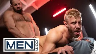 Chuck Conrad grips muscular Mateo Tomas in powerful arms to suck big uncut cock