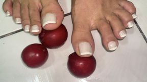 rubbing plums on my feet for you to taste.