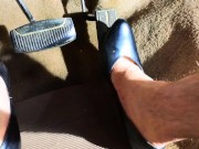 Pedal pumping crossdresser in high heels Stalled car