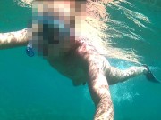 Nude diving and snorkeling in the sea