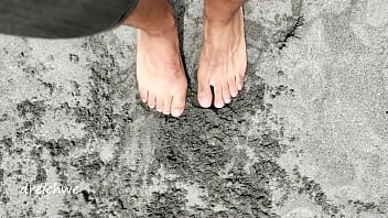 playing with my feet on the beach