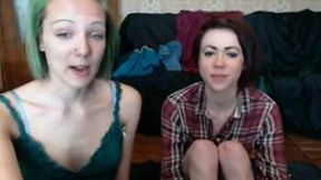 Pale red and green haired amateur lesbians tickle pussies on webcam
