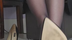 Smelling nylon feet under desk POV