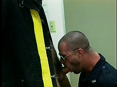 Dick-greedy fireman goes down on a hung policeman and gets a favor in return