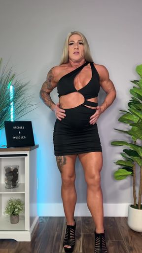Female bodybuilder in black dress