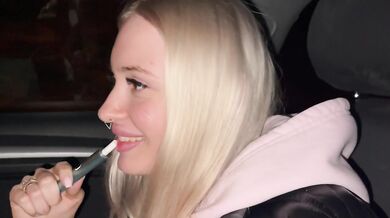 Blonde bombshell deep throats cock while driving highway