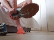 That guy comes home and removes his trainers and socks