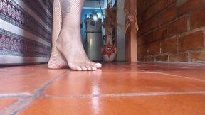 The soles of my bare feet with fisherman network stockings (3)