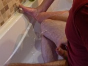Two guys in the bathroom had a pissing game and pissed on each other. Homemade fetish gay porn