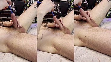 Sounding his cock