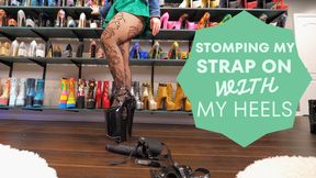MDIGIA stepping on her huge strap on with her high heels