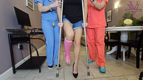 Nurses Vicky and Kitty teach Maleka how to use crutches