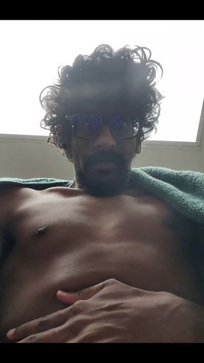 Masturbating